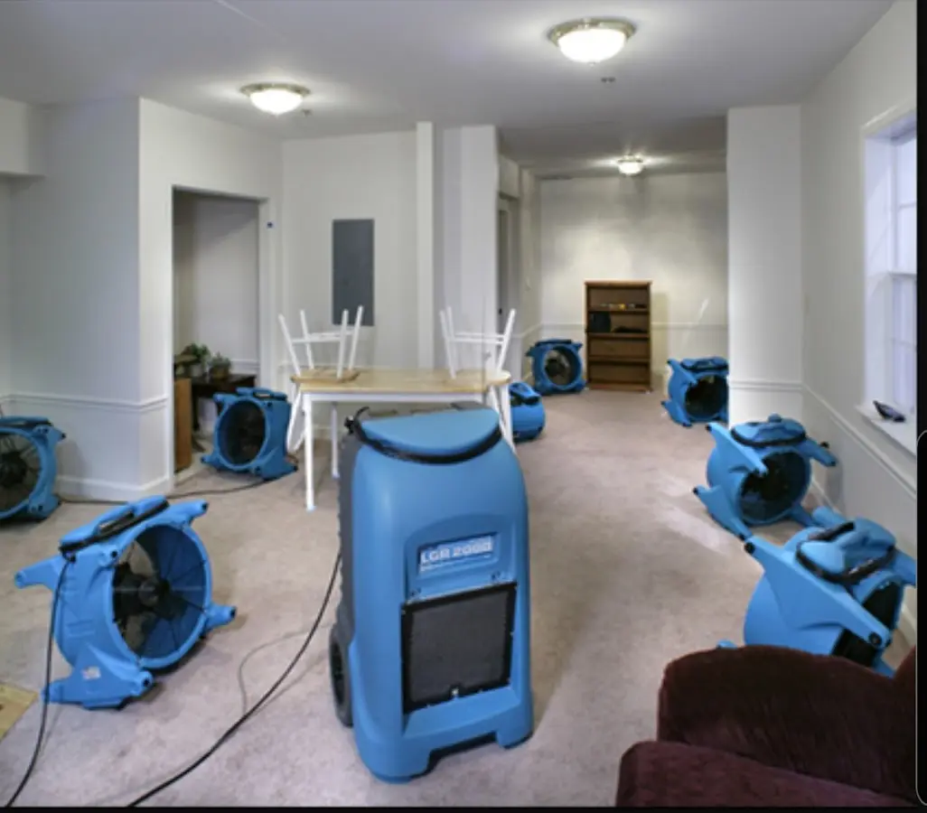 Air movers and dehumidifier setup for Water Damage Restoration in Ogden